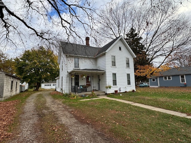 front facade with a front yard