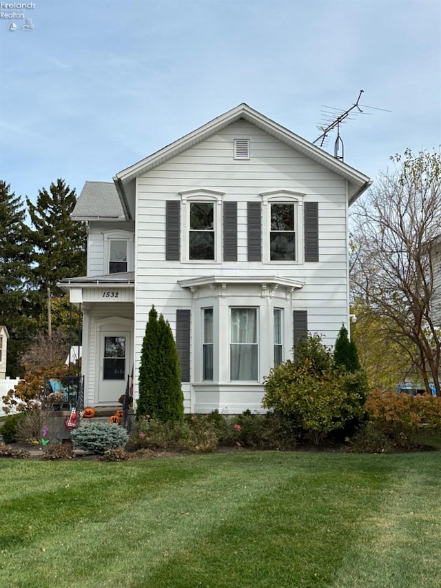 view of front of house with a front yard