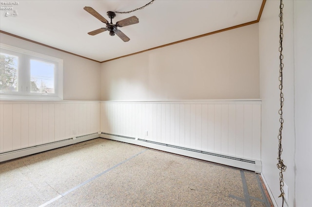 unfurnished room featuring ceiling fan and crown molding