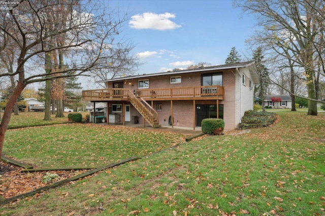 back of property featuring a yard and a deck