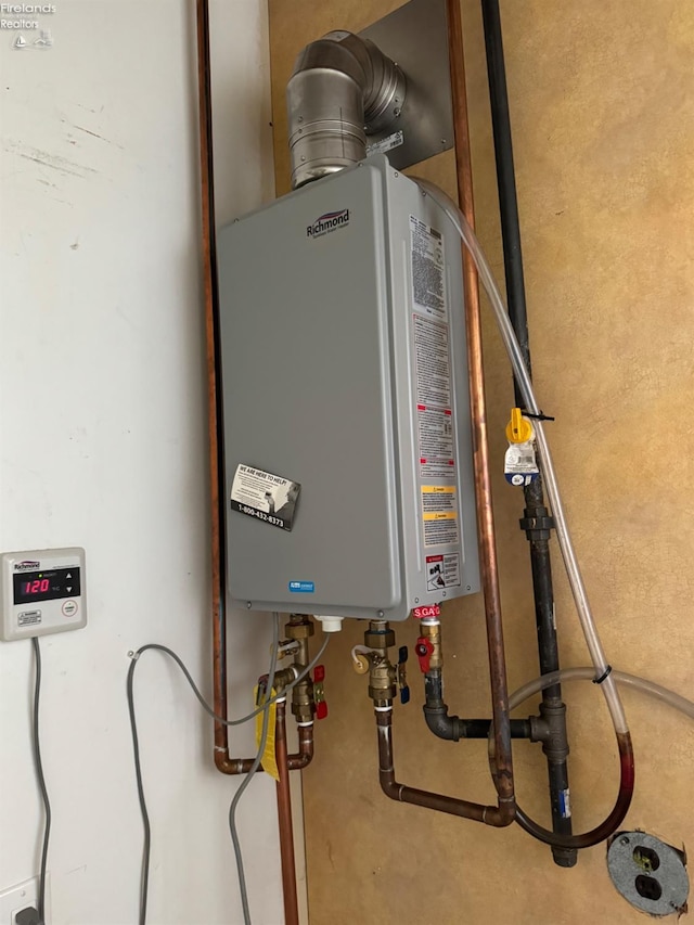 utility room with water heater