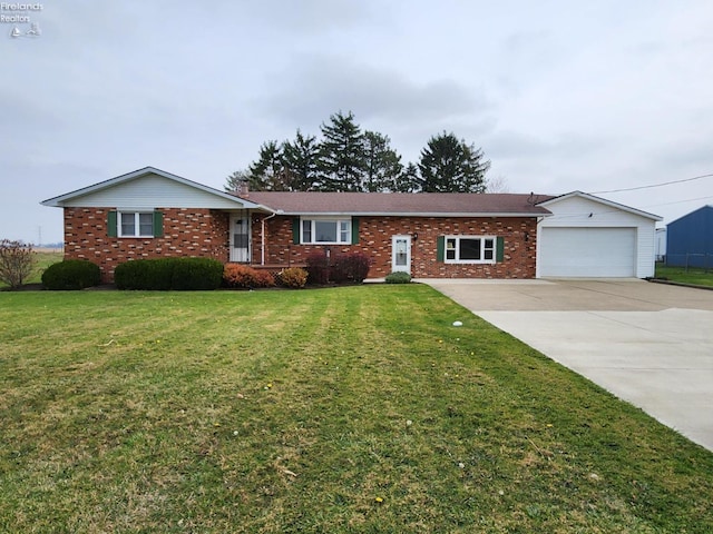 ranch-style house with a garage and a front yard