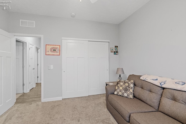 2133 S Harbor Bay Dr, Marblehead, OH 43440 - living area with light colored carpet and baseboards