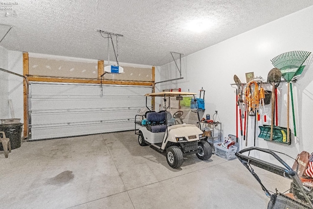 garage featuring a garage door opener