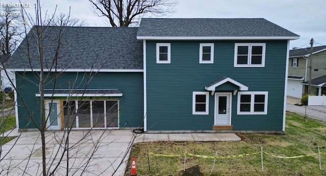 view of front of property with a patio