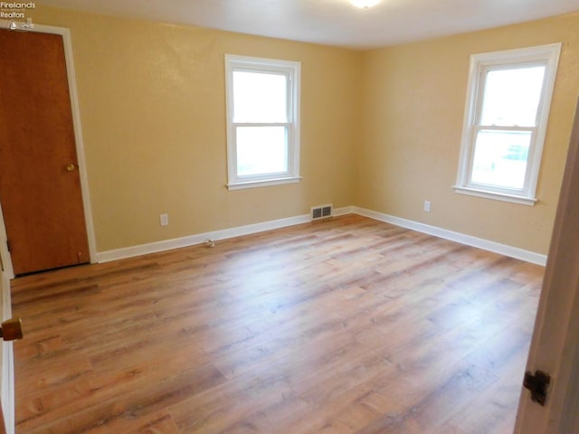 empty room featuring light hardwood / wood-style flooring