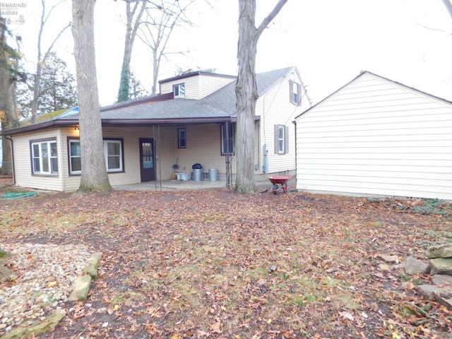 back of property featuring a patio area