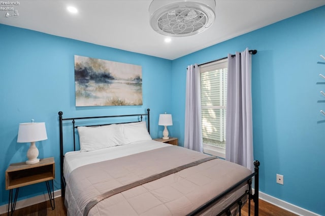 bedroom featuring dark hardwood / wood-style floors