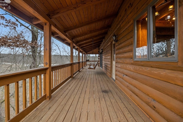 view of snow covered deck