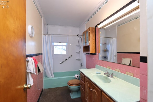 full bathroom with shower / bath combination with curtain, toilet, tile walls, and vanity