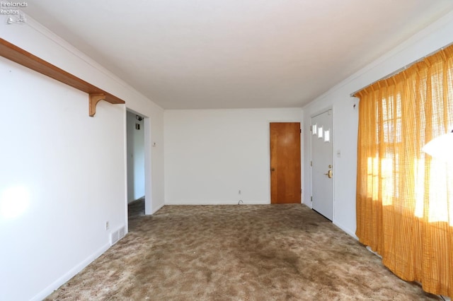 view of carpeted spare room