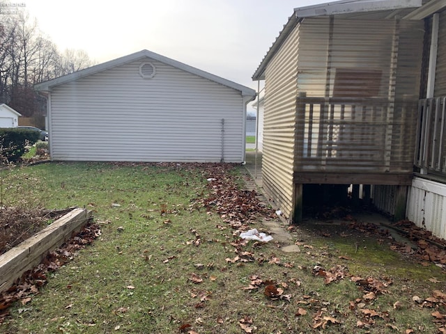 view of property exterior featuring a deck and a lawn