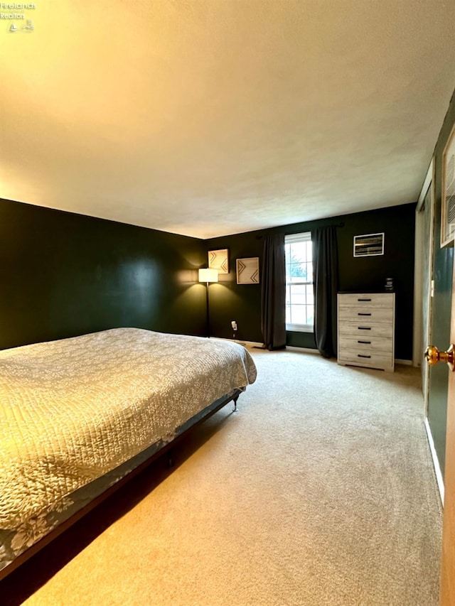 bedroom featuring carpet flooring