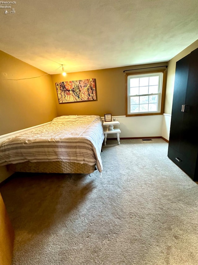 unfurnished bedroom featuring carpet