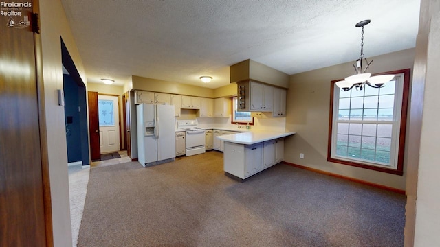 kitchen featuring kitchen peninsula, white appliances, light colored carpet, white cabinets, and hanging light fixtures