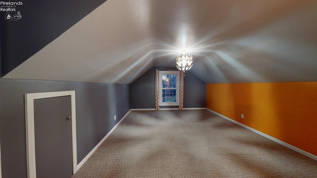 additional living space with carpet and lofted ceiling