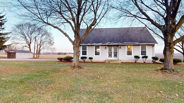 ranch-style house with a yard