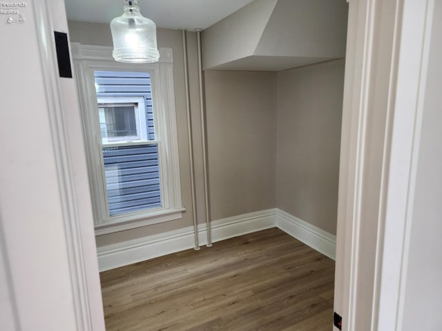 spare room with hardwood / wood-style flooring