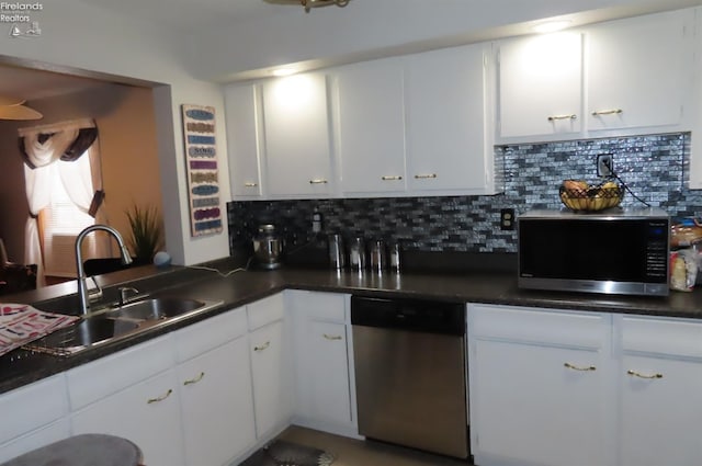 kitchen featuring white cabinets, sink, and stainless steel appliances