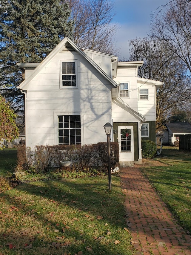 exterior space with a front lawn