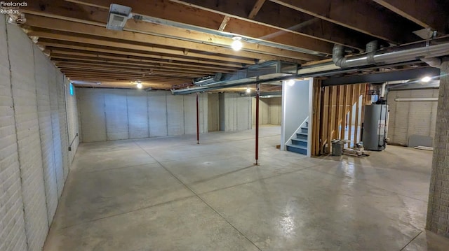 basement featuring water heater