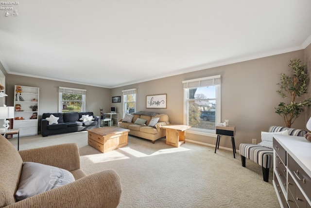 carpeted living room featuring ornamental molding