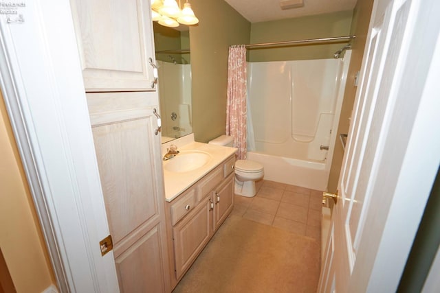 full bathroom featuring tile patterned floors, vanity, toilet, and shower / bathtub combination with curtain