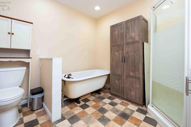 bathroom featuring plus walk in shower and toilet