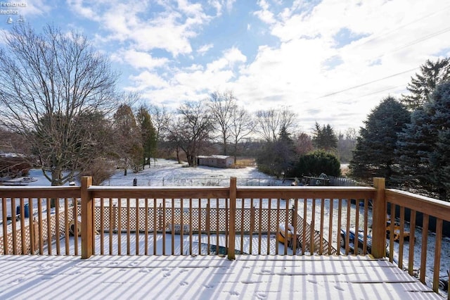 view of snow covered deck