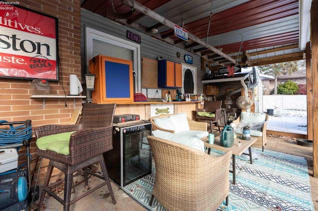 view of patio / terrace with beverage cooler