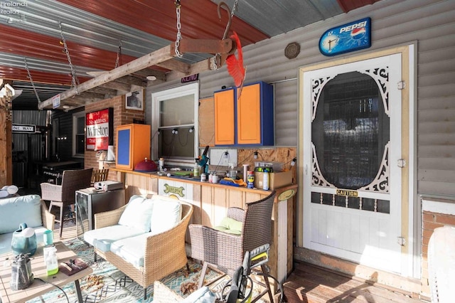 interior space with washer / dryer and wood-type flooring