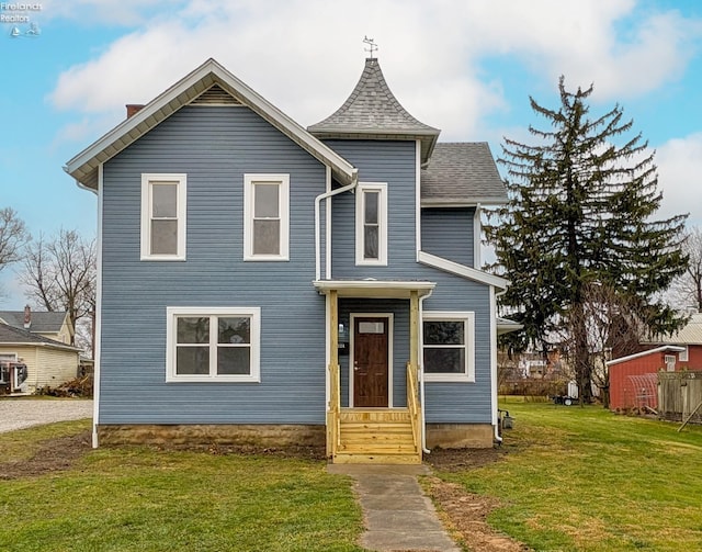 view of front of home with a front yard