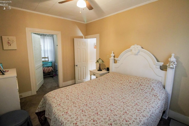 carpeted bedroom featuring ceiling fan and ornamental molding