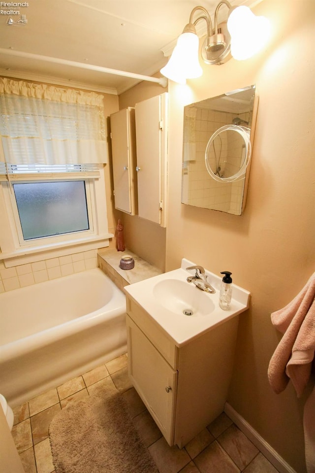 bathroom with tile patterned floors and vanity