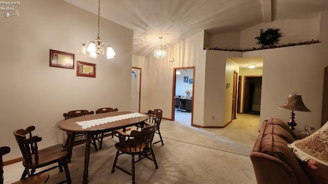 carpeted dining space with beam ceiling, high vaulted ceiling, and an inviting chandelier