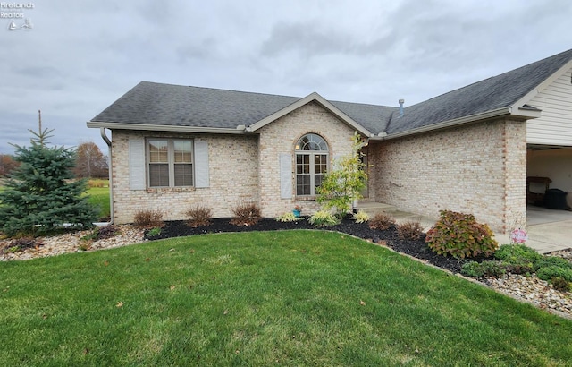 view of front of home with a front yard