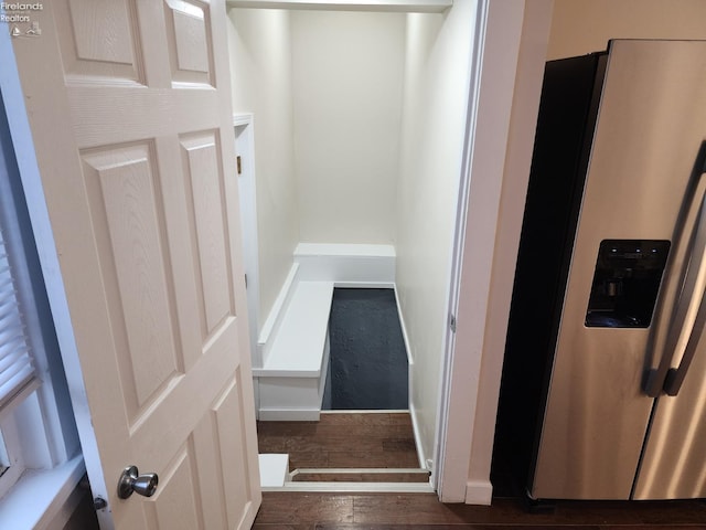 stairs with hardwood / wood-style floors