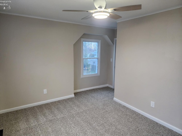 additional living space with carpet flooring and ceiling fan