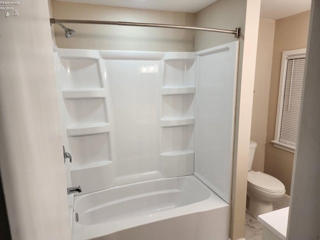 full bathroom with vanity,  shower combination, and toilet