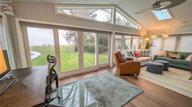 sunroom / solarium with vaulted ceiling and ceiling fan