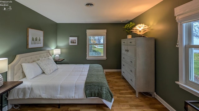 bedroom featuring light wood-type flooring