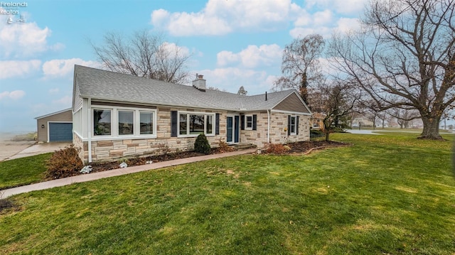 ranch-style home with a front lawn