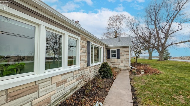 view of property exterior featuring a yard