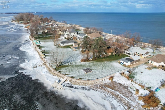 birds eye view of property featuring a view of the beach and a water view