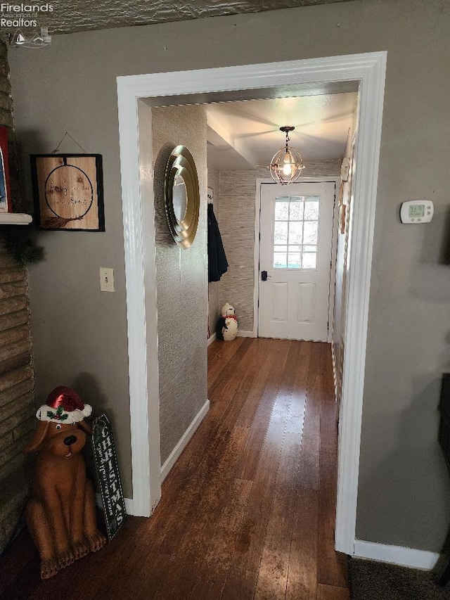 doorway featuring hardwood / wood-style flooring