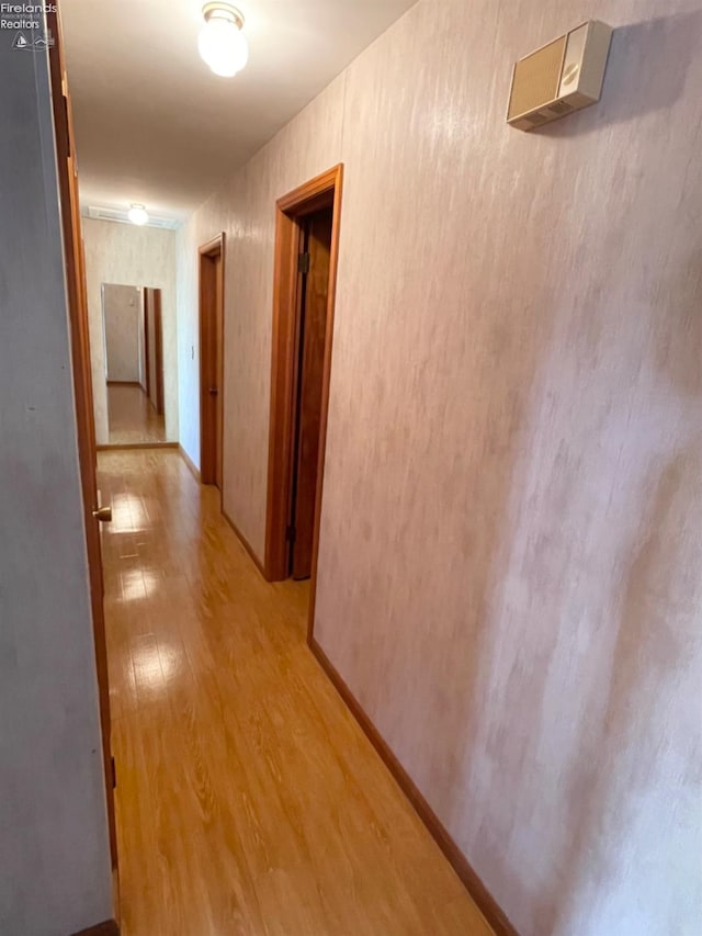 corridor featuring light wood-type flooring