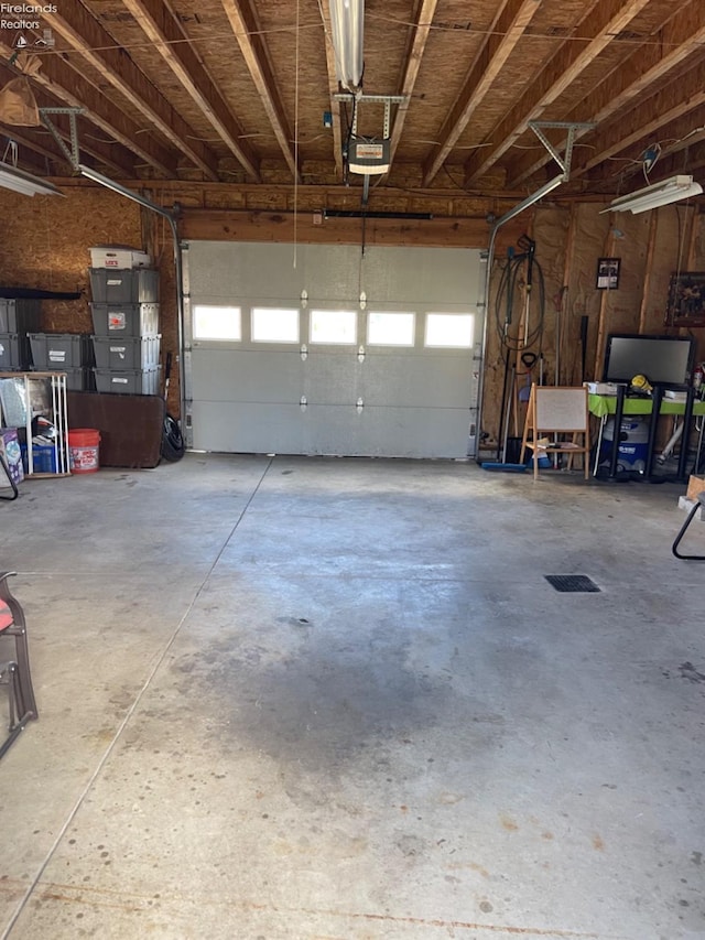 garage with a garage door opener