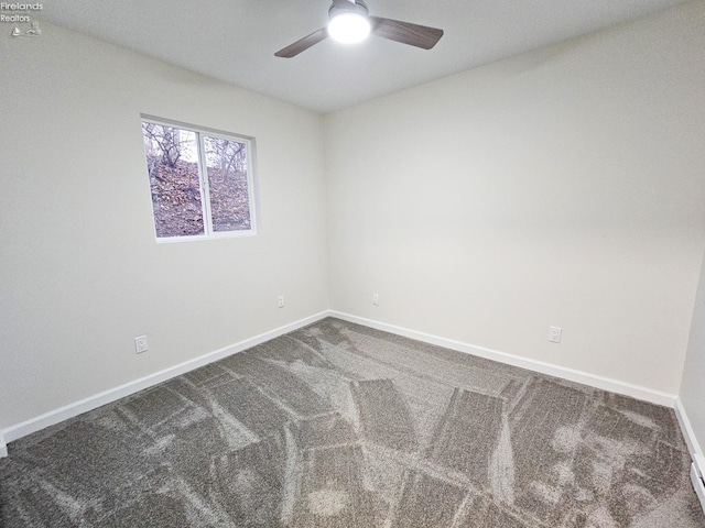 unfurnished room with carpet flooring and ceiling fan