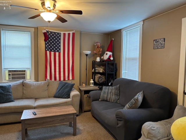 living room with ceiling fan and cooling unit