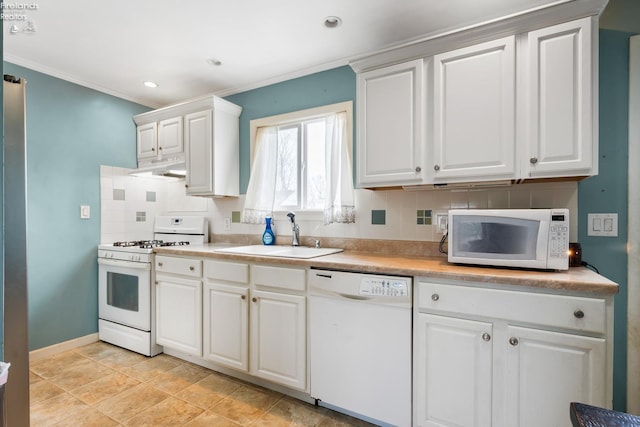 kitchen featuring sink, white appliances, decorative backsplash, white cabinets, and ornamental molding